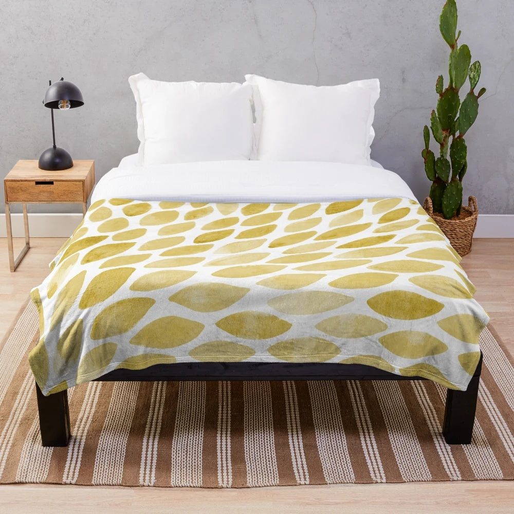 Watercolor brush strokes plush blanket in yellow and ochre tones