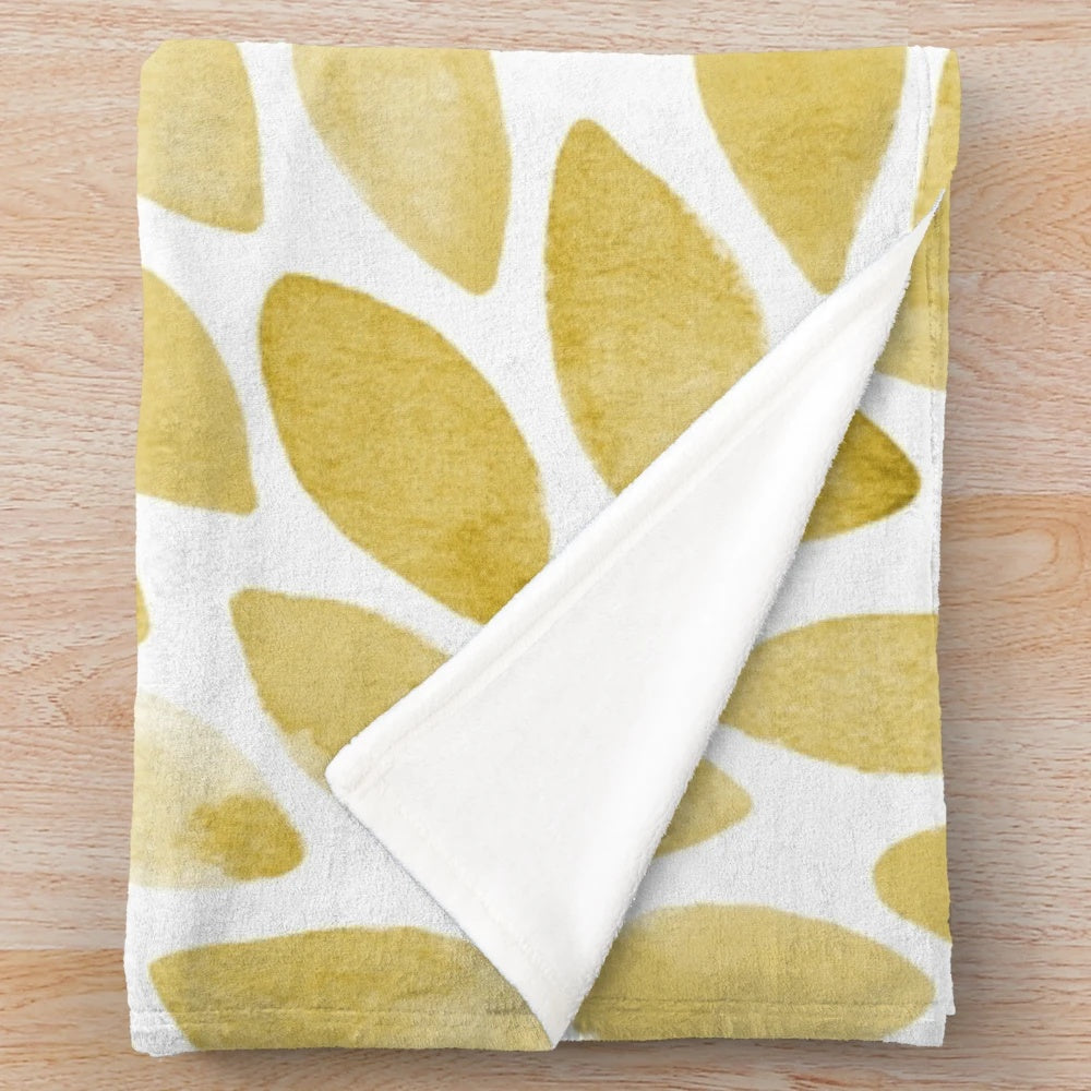 Watercolor brush strokes plush blanket in yellow and ochre tones