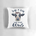 Watercolor painting of a cow on a soft throw pillow for animal lovers