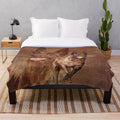 Watercolor image of a Dutch Shepherd dog breed on a plush blanket