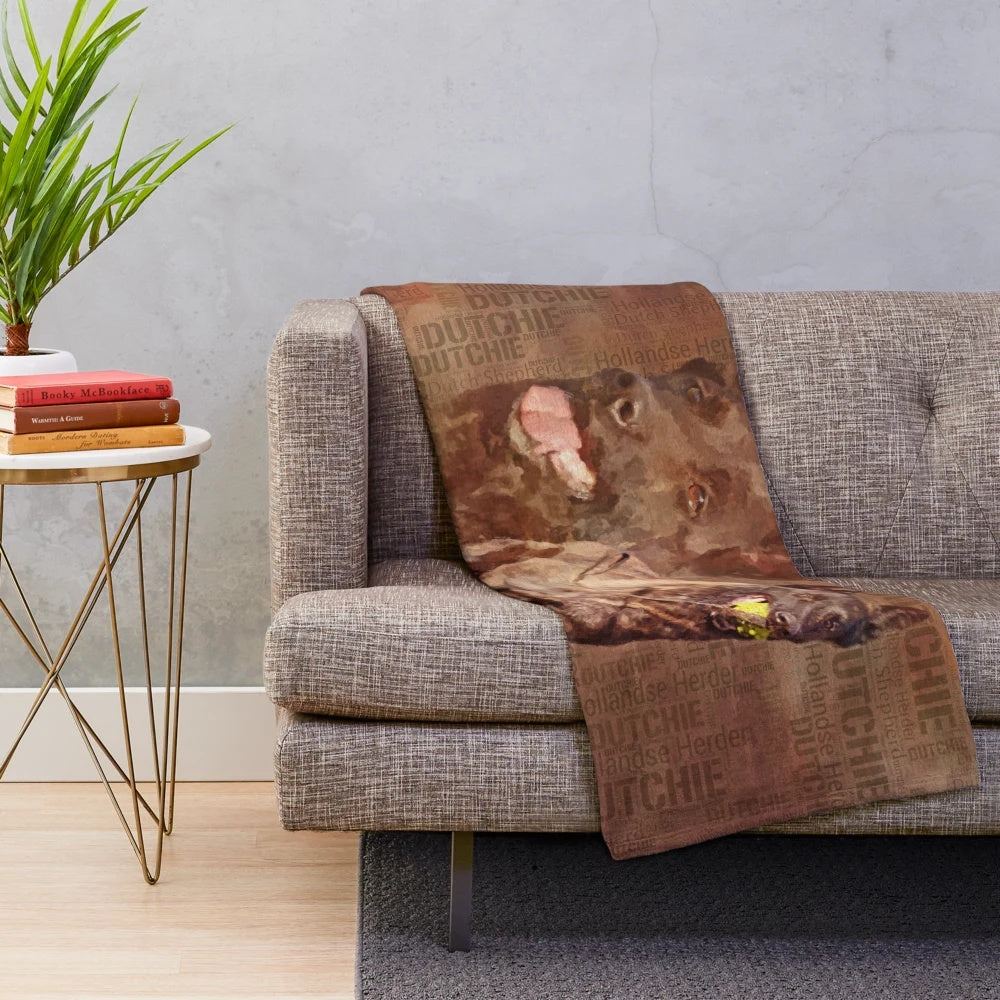 Watercolor image of a Dutch Shepherd dog breed on a plush blanket