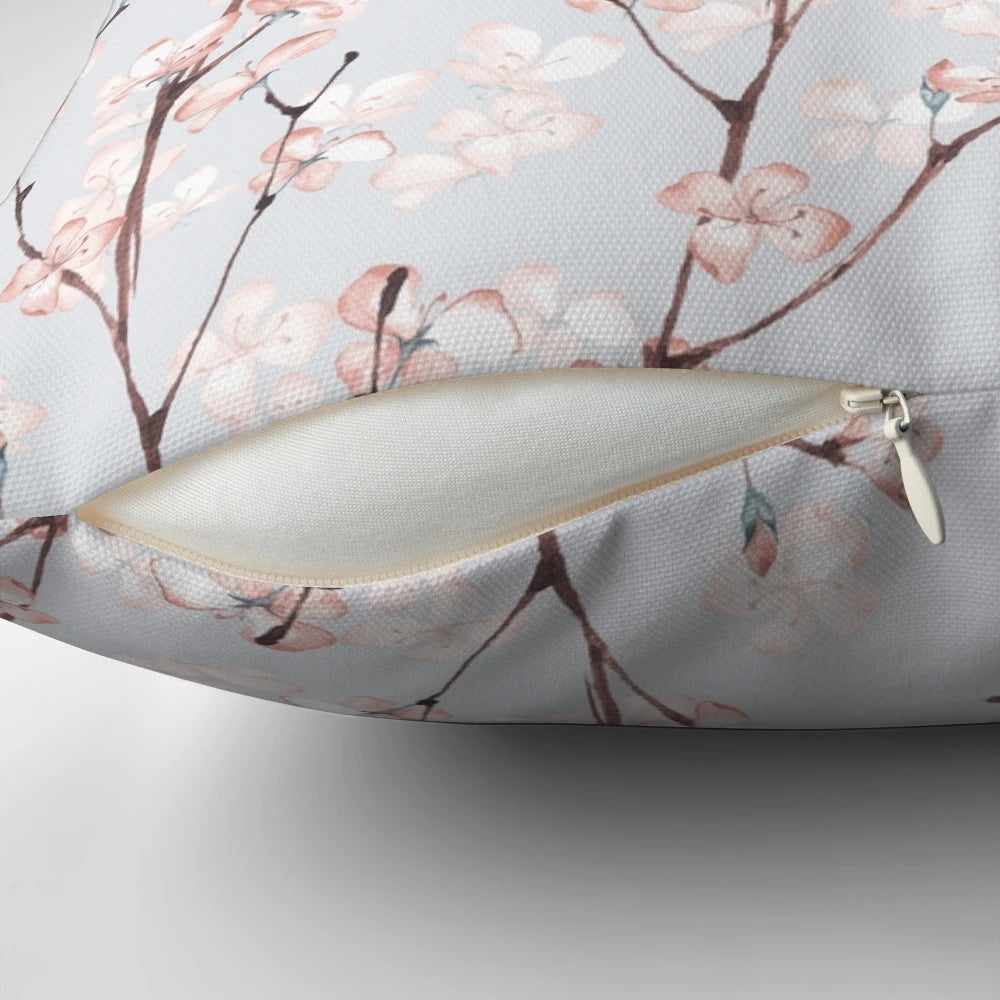 A Pillow showcasing a watercolor floral blossom seamless pattern.
