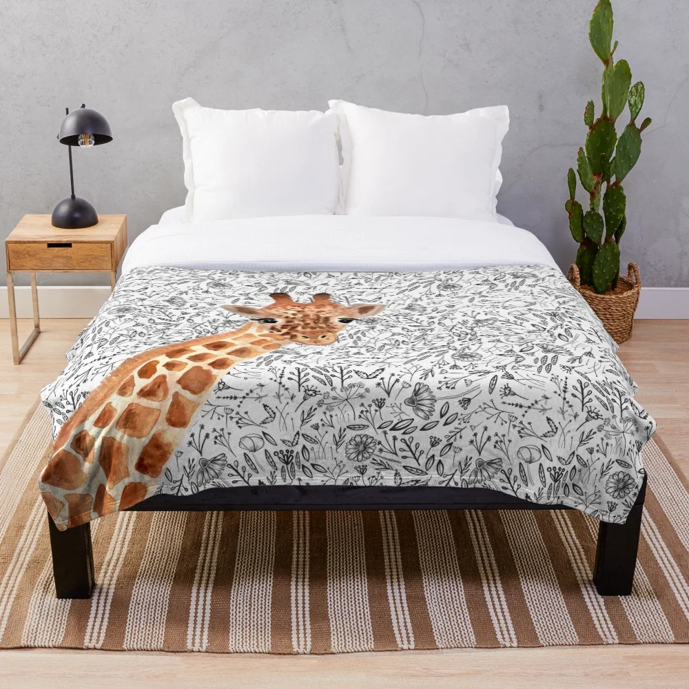 Watercolor giraffe print plush blanket for cozy, whimsical home decor
