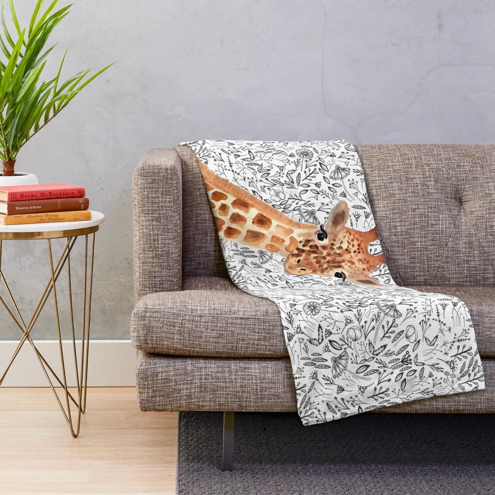 Watercolor giraffe print plush blanket for cozy, whimsical home decor