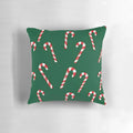 Watercolor green and white candy cane pattern pillow with a cozy, festive design for the holidays.