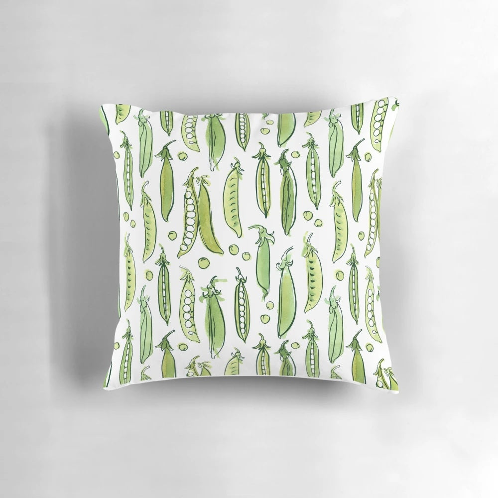Watercolor illustration of green peas on a decorative pillow for organic, vegetarian home design.