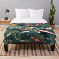 Watercolor koi fish pond design on a plush blanket