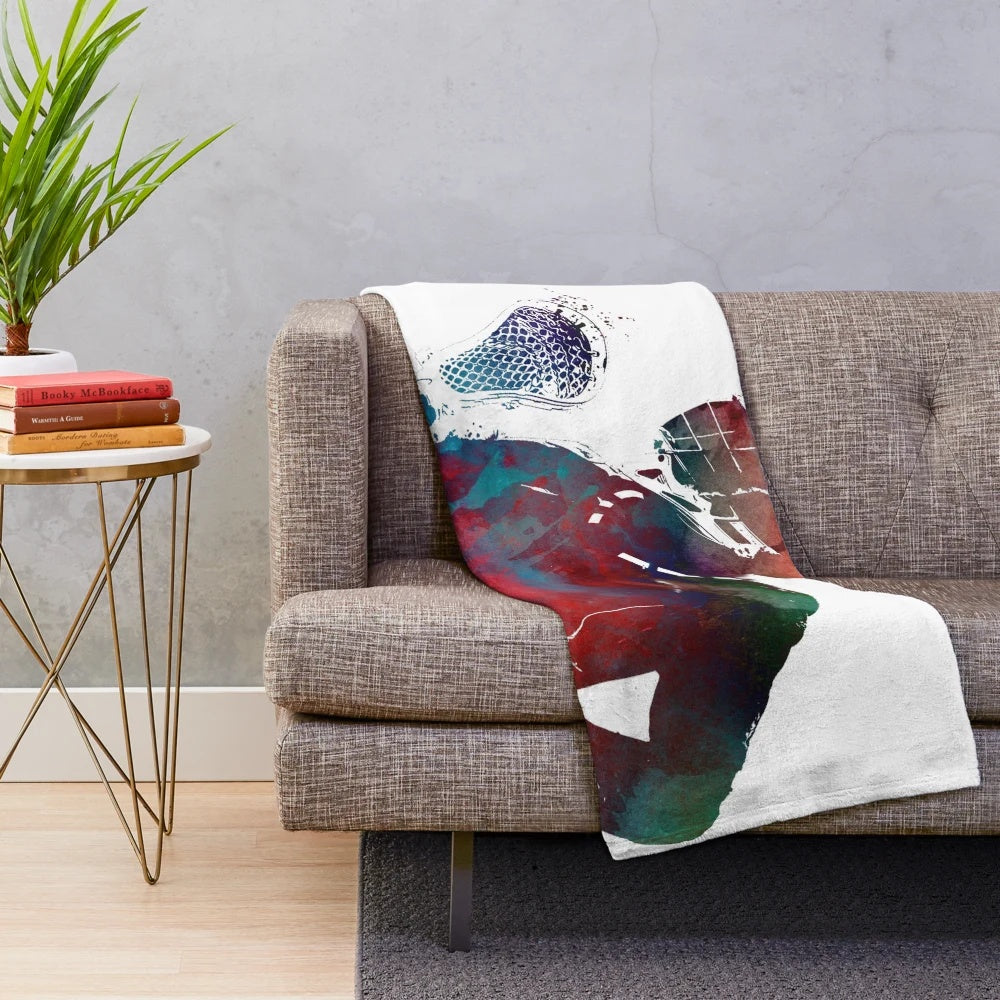 Watercolor lacrosse player illustration on a plush blanket