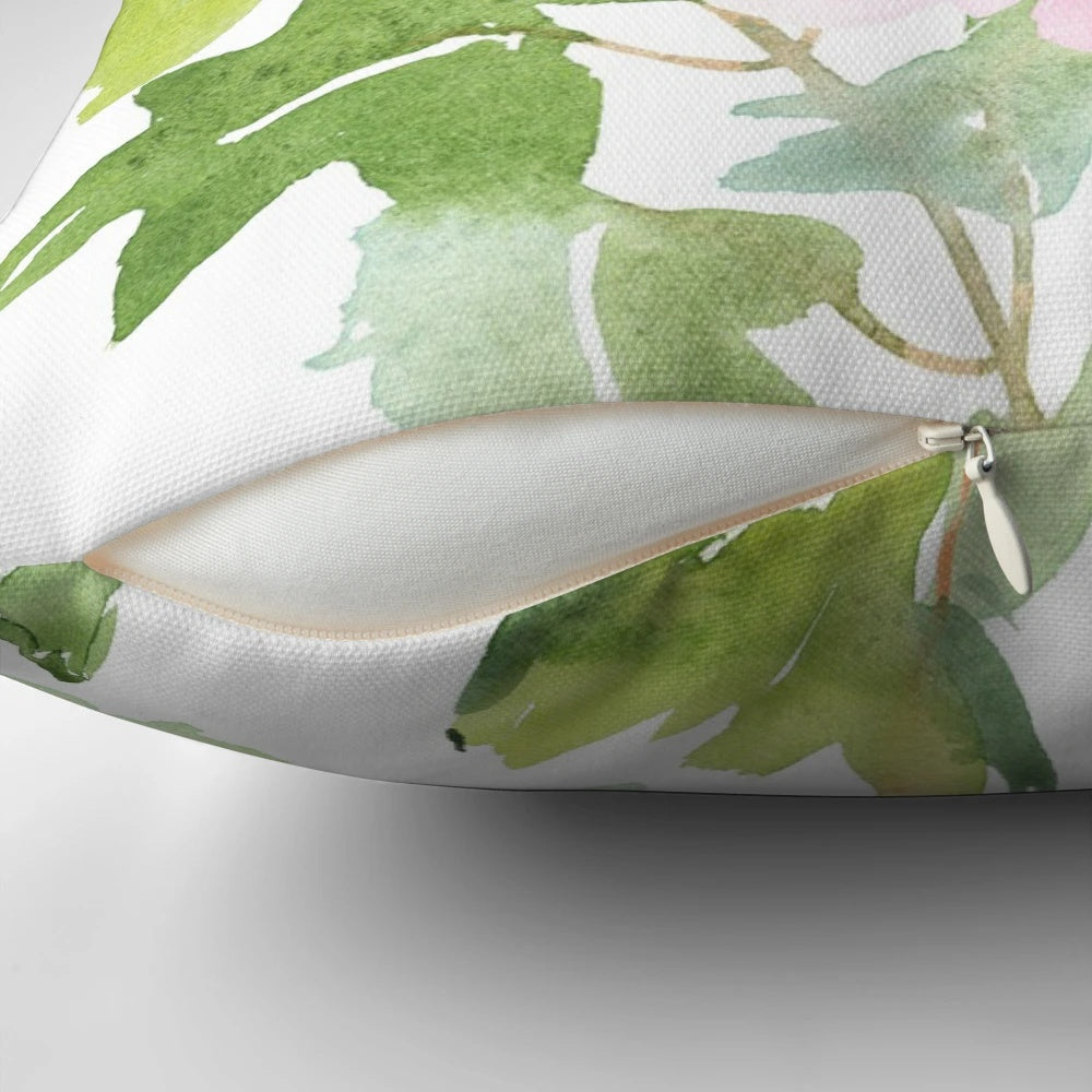 A beautiful watercolor painting of pink peonies on a soft throw pillow for romantic home decor.