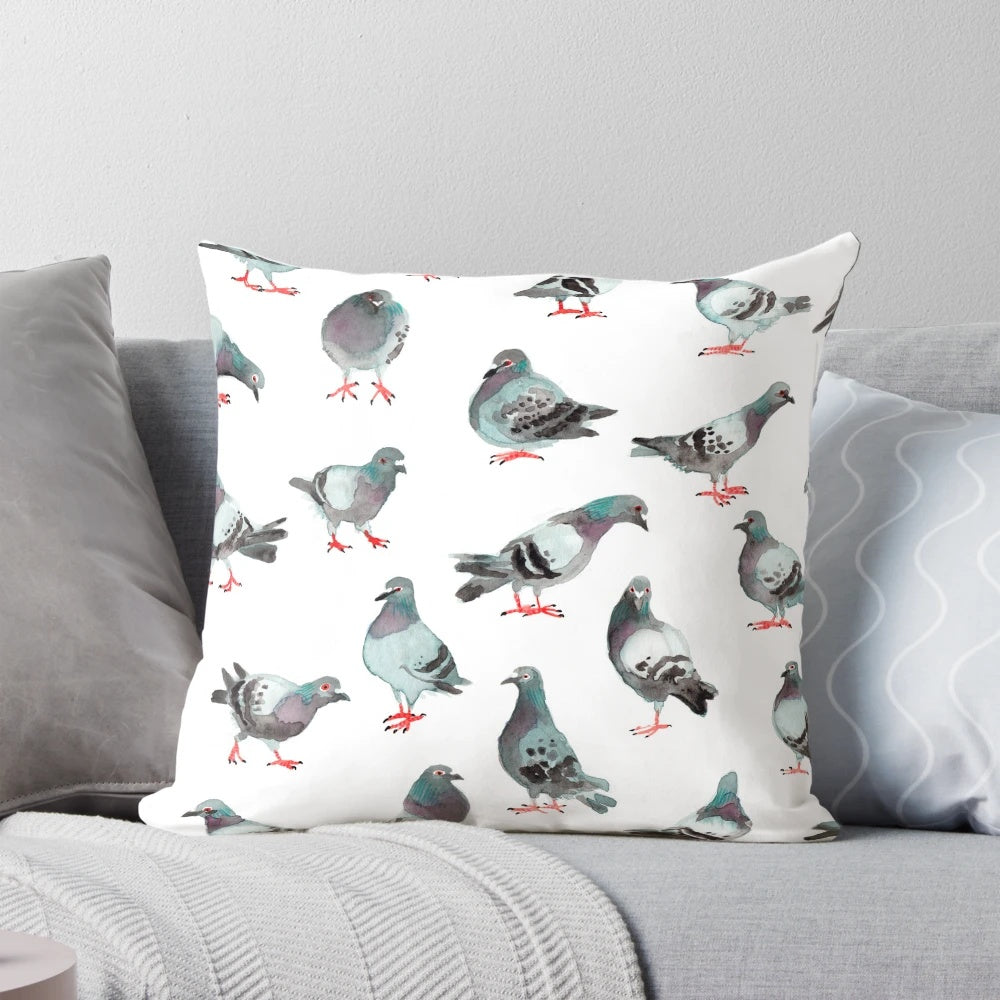 A pillow featuring a watercolor pattern of cute pigeons