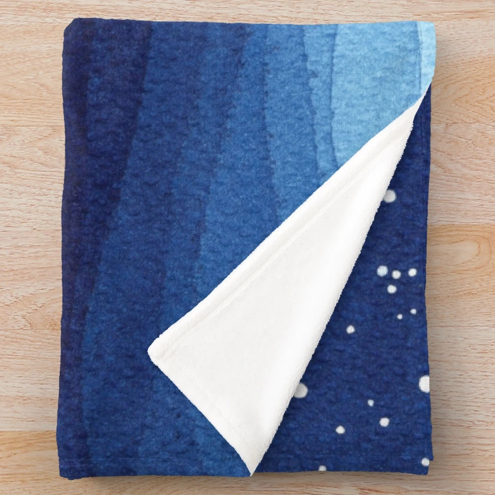 Watercolor-style plush blanket featuring a sailboat on a night sea with shooting stars