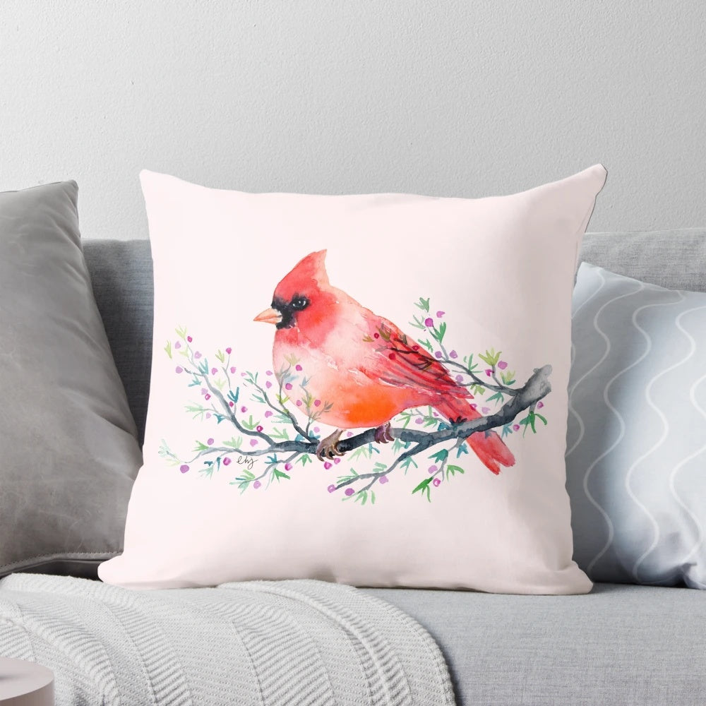 Vibrant watercolor painting of a red cardinal bird perched on a berry branch