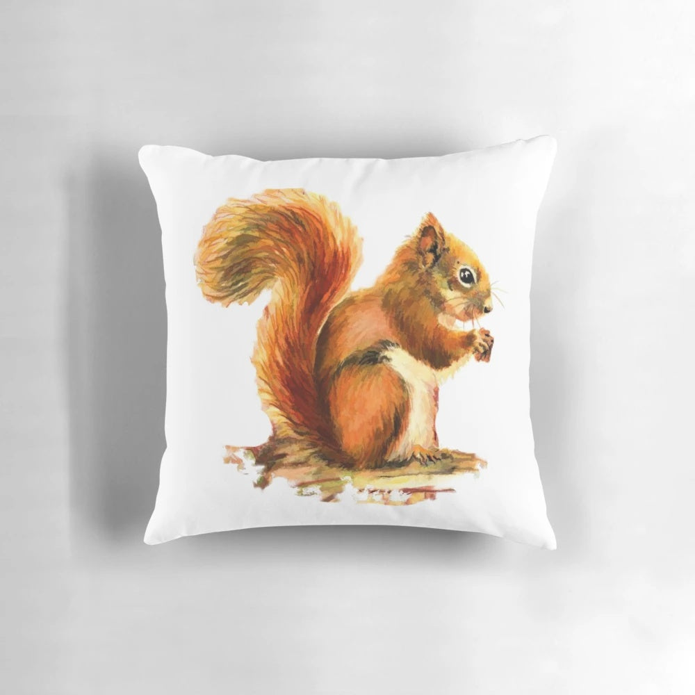 Vibrant watercolor illustration of a red squirrel on a soft, plush pillow for nature-inspired home decor.