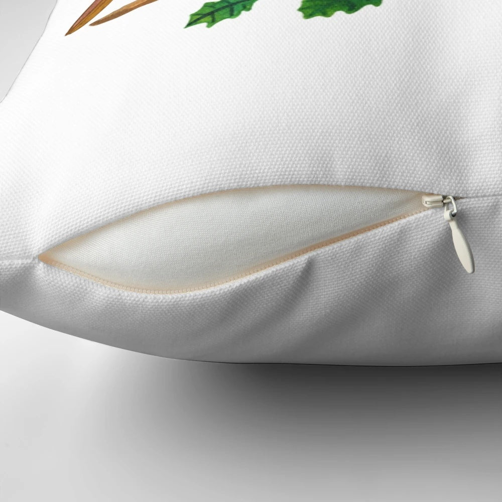 Watercolor painting of a robin bird perched on a branch, printed on a cozy throw pillow for Christmas decor.