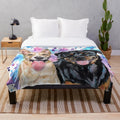 Watercolor illustration of a Rottweiler and Staffy on a plush blanket