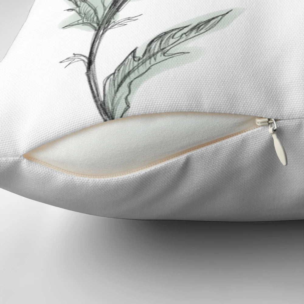 Watercolor painting of a Scottish thistle flower on a decorative throw pillow