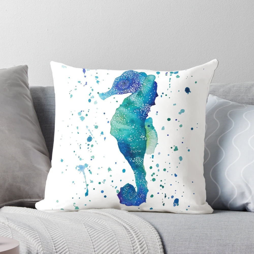 Watercolor painting of a seahorse on a decorative throw pillow