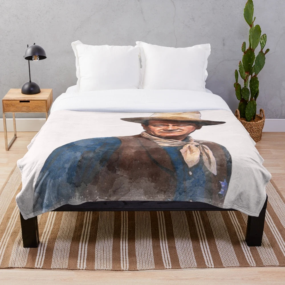 Soft, watercolor-style plush blanket featuring the iconic image of Hollywood legend John Wayne