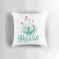 Vibrant watercolor succulent design on a soft, supportive yoga pillow for mindfulness and relaxation.