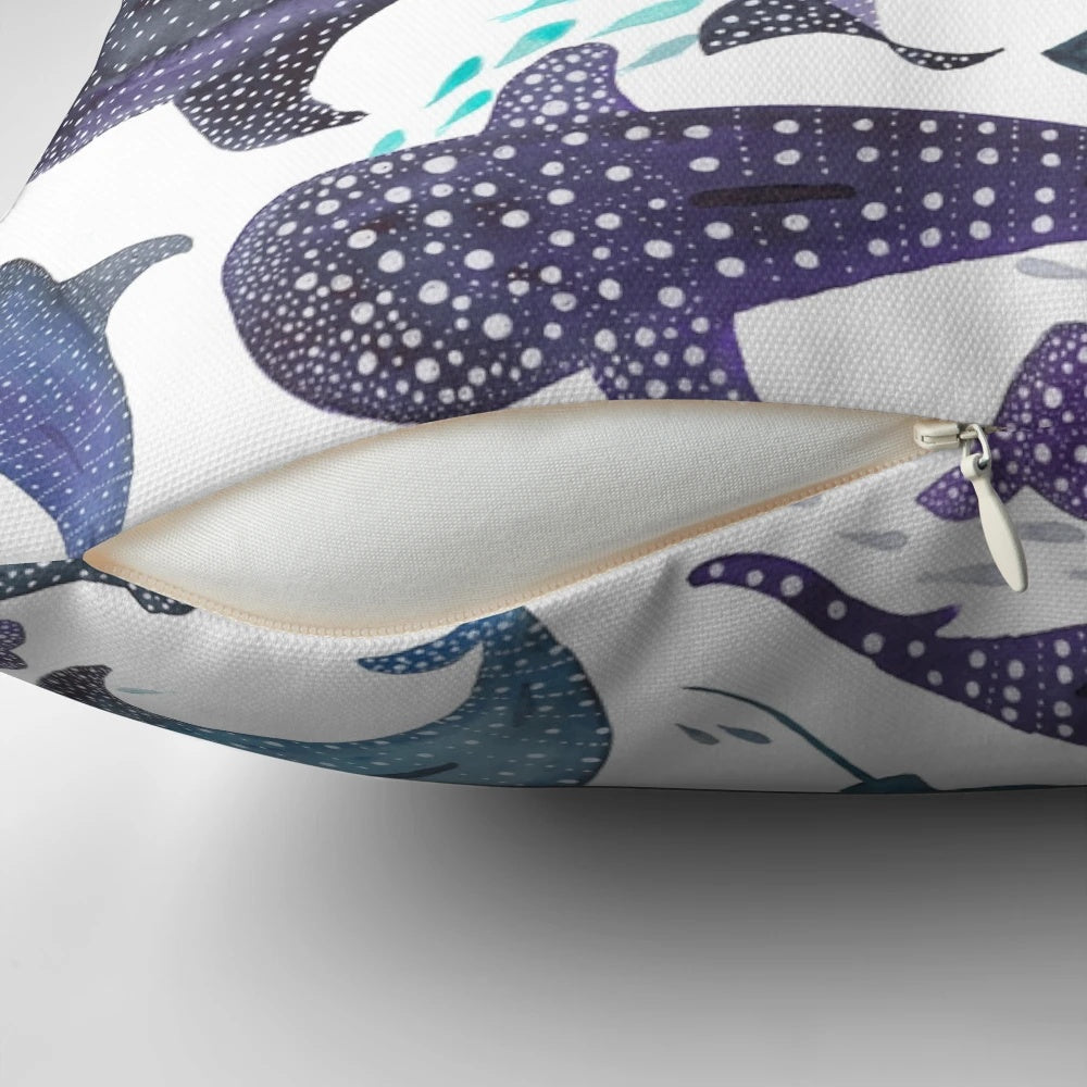 Decorative throw pillow featuring a watercolor-style illustration of a whale shark, ray, and other marine life.