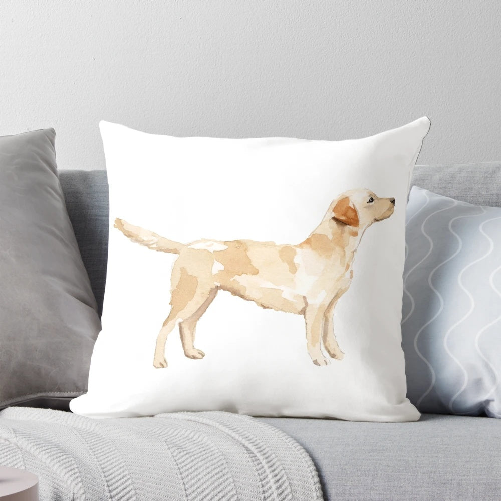 A watercolor illustration of a yellow Labrador retriever dog in silhouette on a decorative throw pillow.