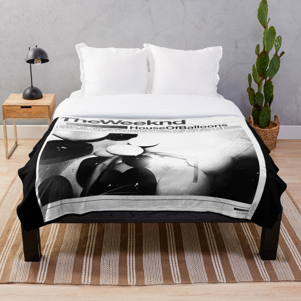 The Weeknd-inspired plush blanket with graphic design