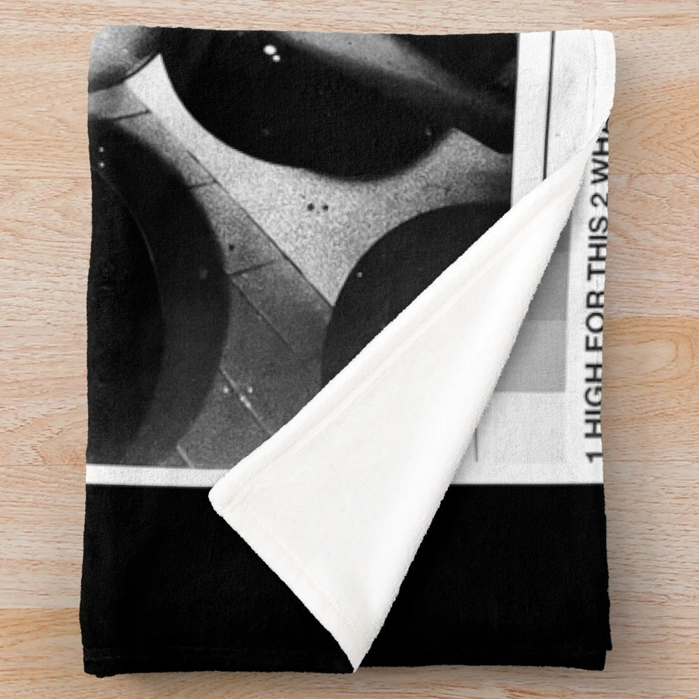 The Weeknd-inspired plush blanket with graphic design
