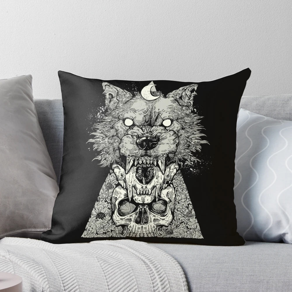 Black and white graphic pillow with a werewolf, skull, and ink design for a gothic home decor accent.