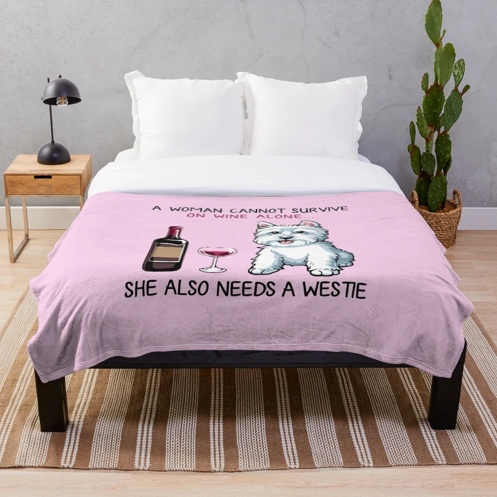 Westie dog on a plush blanket with a wine glass design