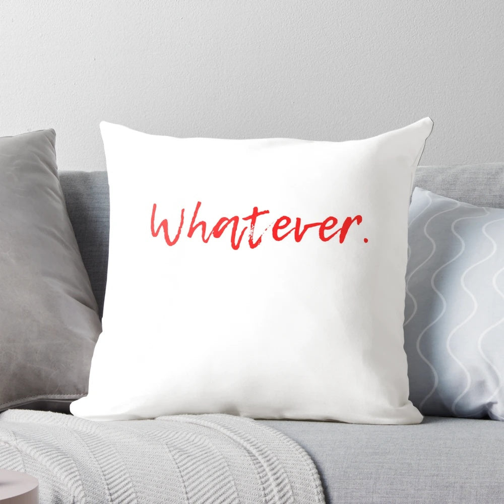 A red and white decorative whatever pillow, a stylish home accessory.