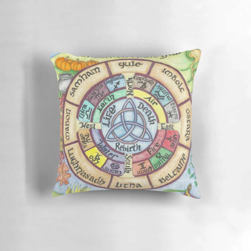 Colorful wheel of the year pillow with pagan and nature-inspired design