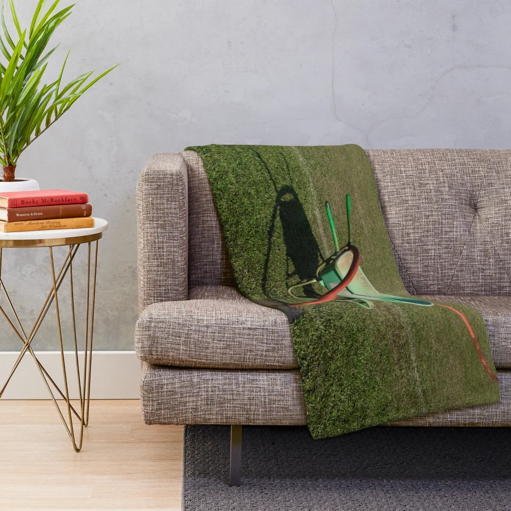 Wheelbarrow-inspired plush blanket for gardening and outdoor activities