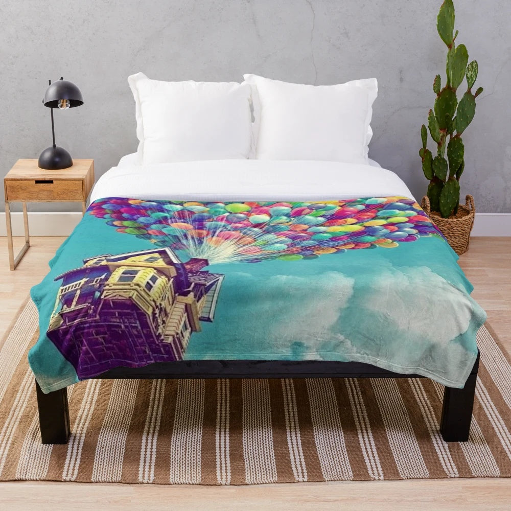 Soft, plush blanket with a whimsical air-themed design, inspired by the Disney movie "Up