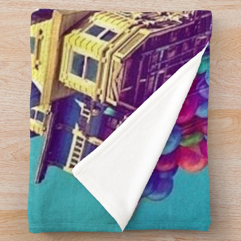 Soft, plush blanket with a whimsical air-themed design, inspired by the Disney movie "Up