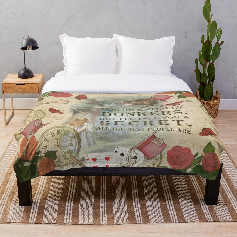 Plush blanket featuring a collage design with Alice, Cheshire Cat, and inspirational quote