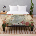 Plush blanket featuring a collage design with Alice, Cheshire Cat, and inspirational quote