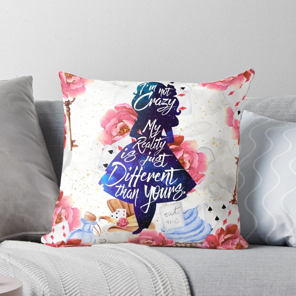 Decorative throw pillow featuring a quote from the classic Alice in Wonderland book