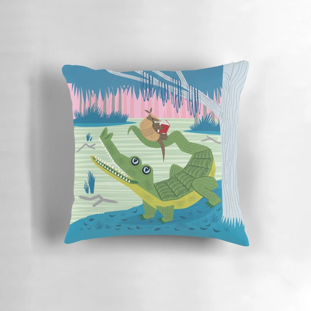 Colorful illustration of an alligator and armadillo on a plush, comfortable children's pillow