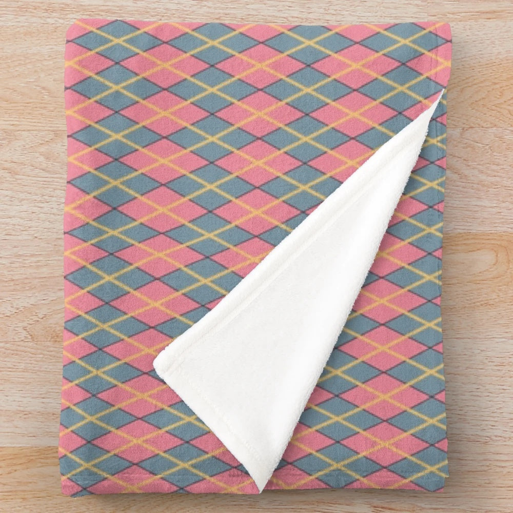 Whimsical argyle plush blanket in pink, gray, and gold