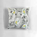 Colorful cartoon illustration of Australian native animals including a wombat, kangaroo, emu, cockatoo, and tawny frogmouth on a decorative pillow.