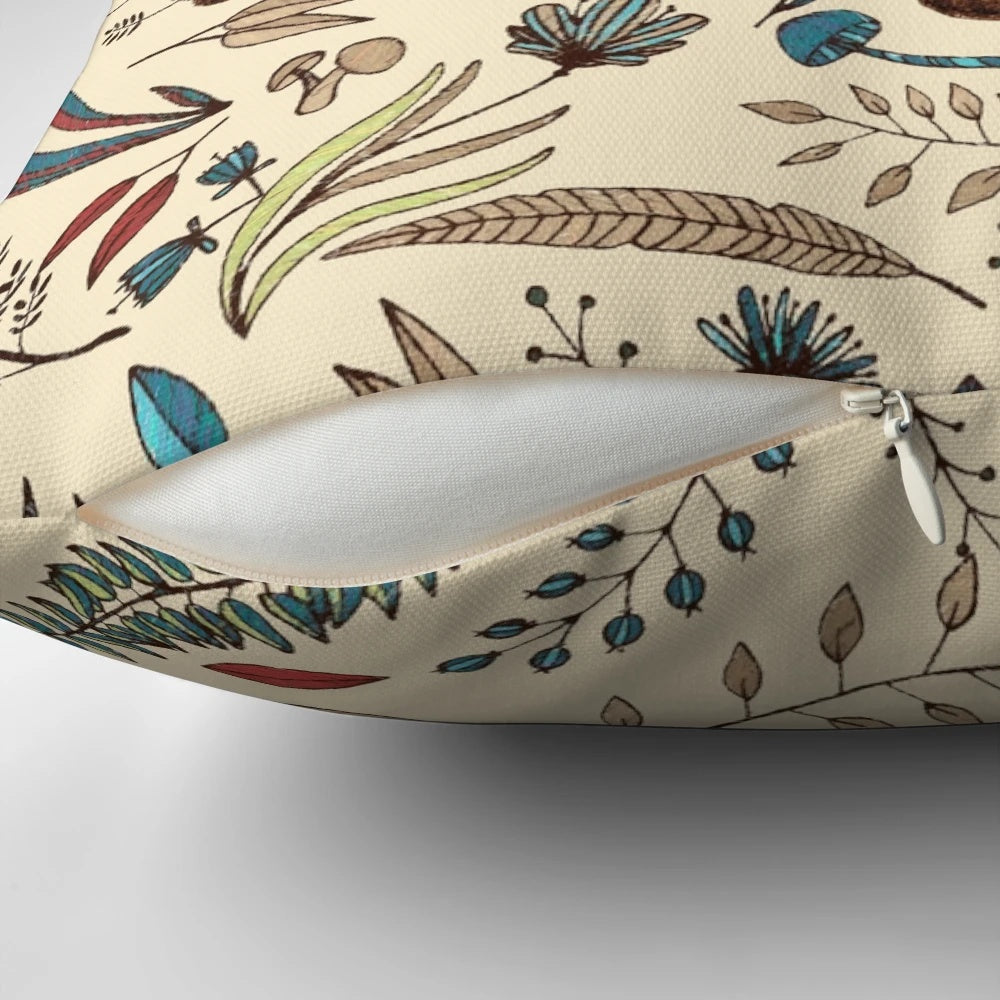 A decorative throw pillow featuring a whimsical illustration of two brown bear cubs surrounded by fantastical forest flora.