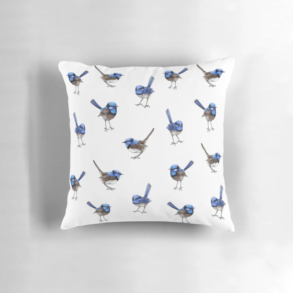 Watercolor painting of beautiful blue wrens scattered on a white pillow