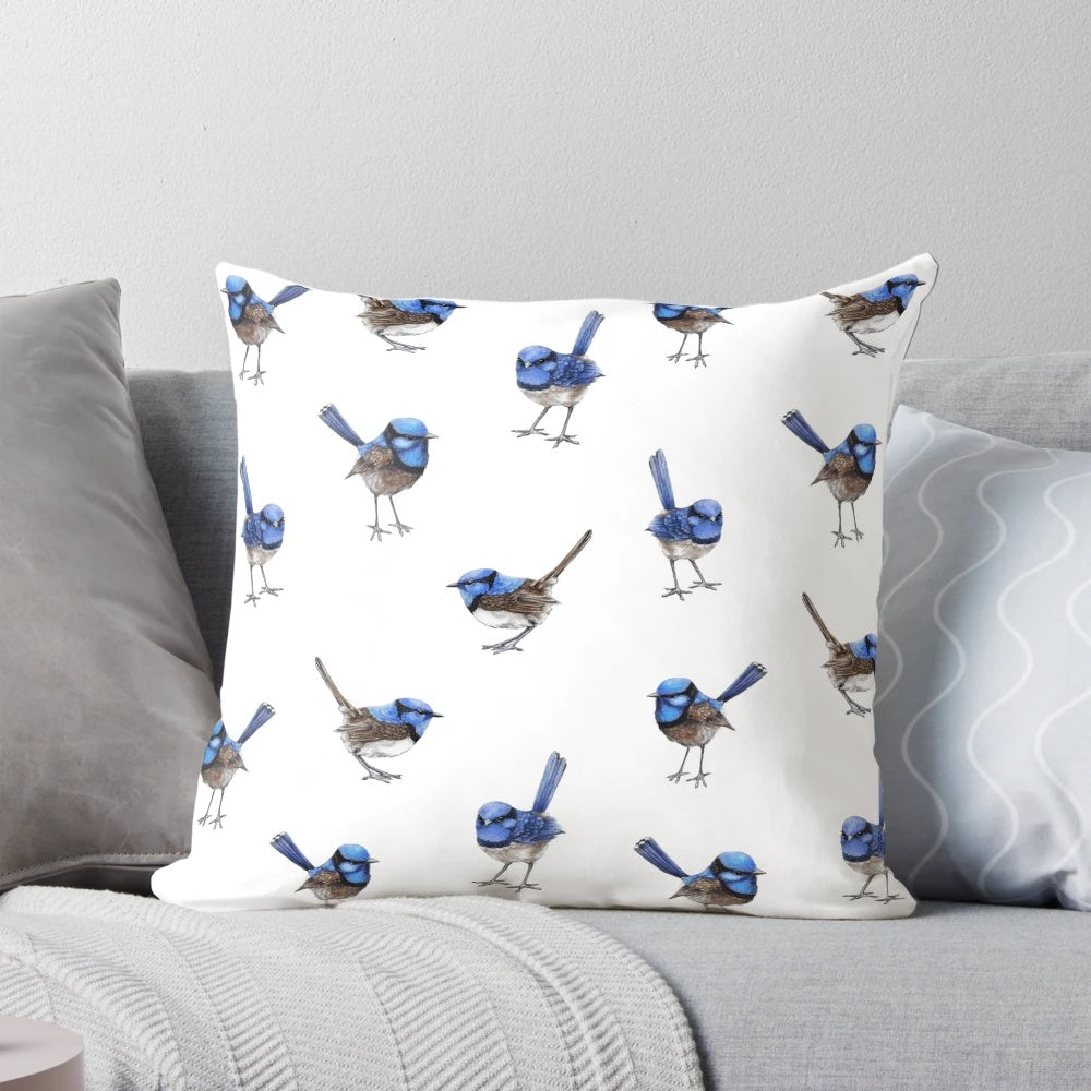 Watercolor painting of beautiful blue wrens scattered on a white pillow