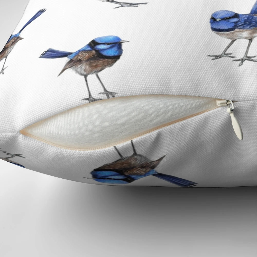 Watercolor painting of beautiful blue wrens scattered on a white pillow