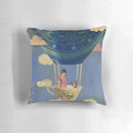 A decorative pillow featuring a dreamy, surreal image of a woman floating among clouds, dogs, and balloons.