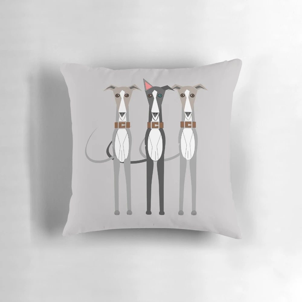 Charming illustration of three whippet, greyhound, and lurcher dogs on a decorative pillow