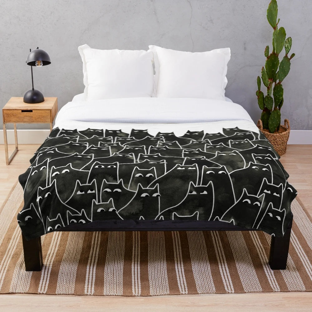 Whimsical black and white cat pattern plush blanket