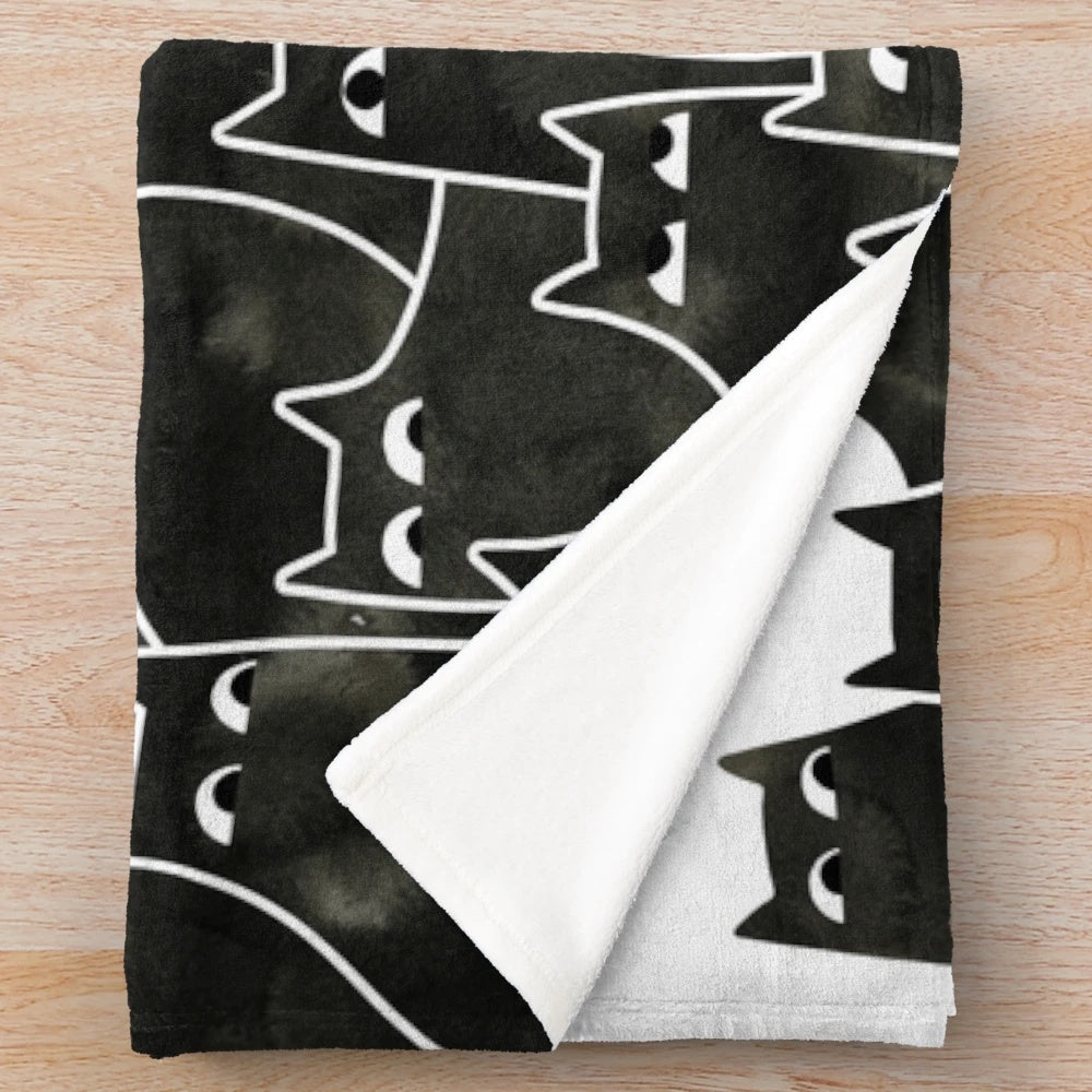 Whimsical black and white cat pattern plush blanket