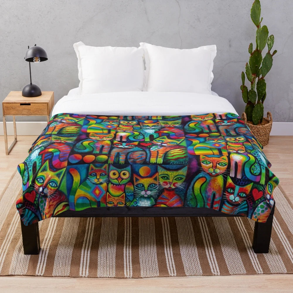 Whimsical plush blanket featuring a colorful illustration of a cat and owl