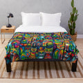 Whimsical plush blanket featuring a colorful illustration of a cat and owl